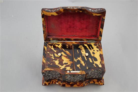 A Regency tortoiseshell and mother of pearl inlaid two division tea caddy, 7.75in.